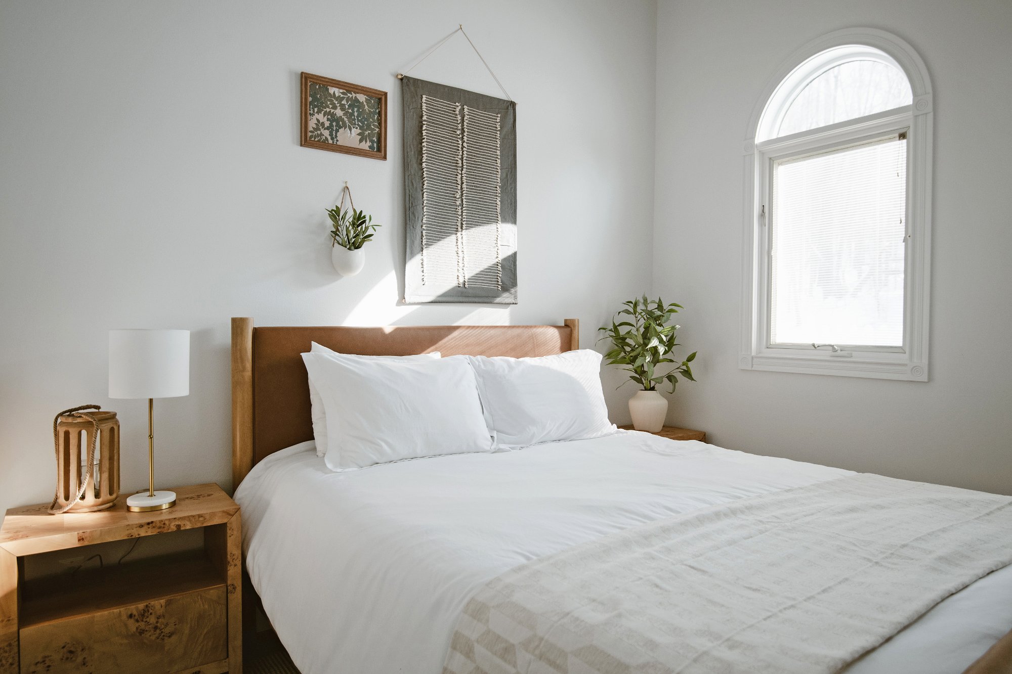 Guest bedroom with wood beam ceiling