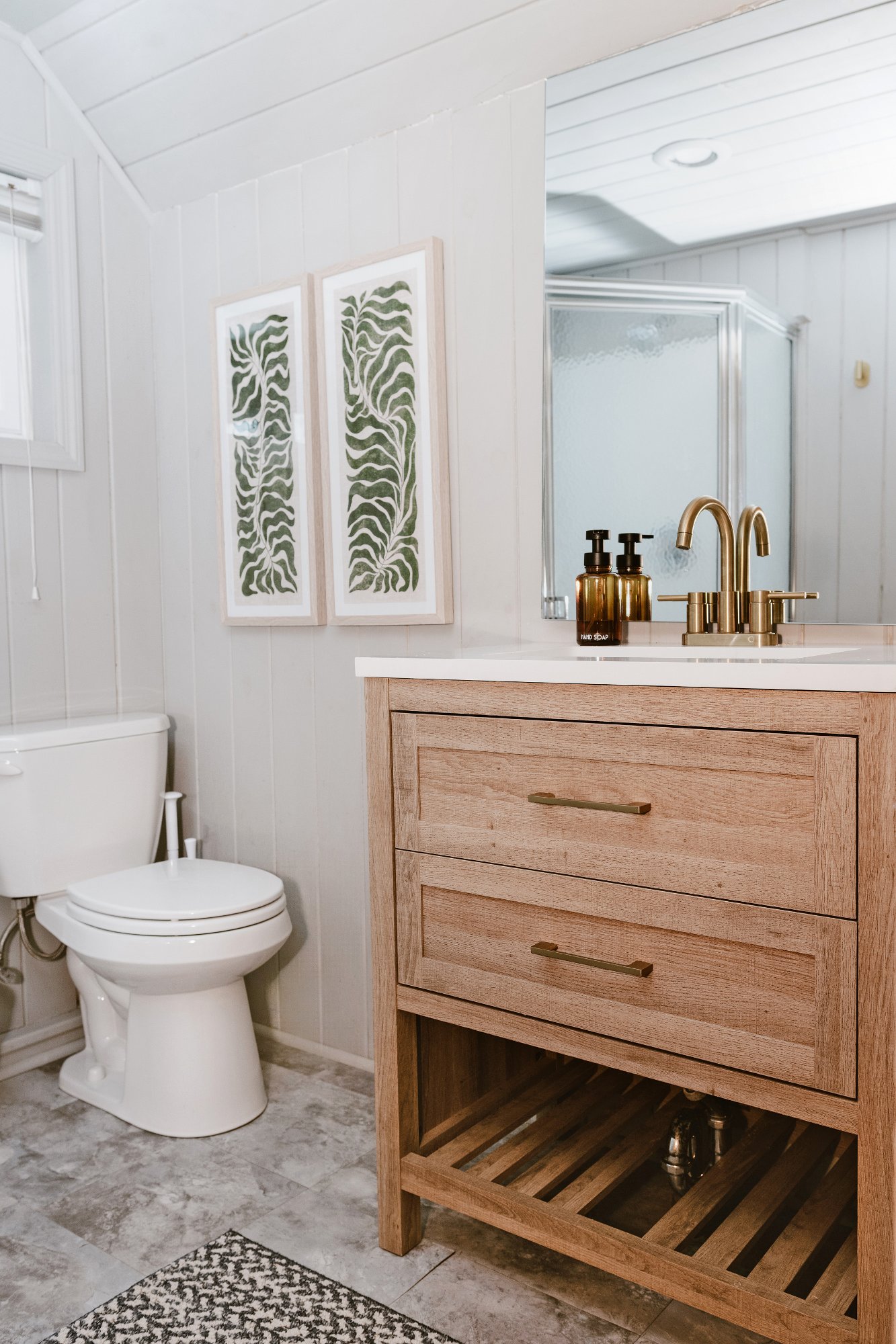 Lower level bathroom with oak vanity